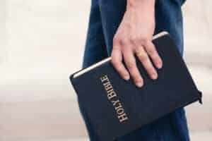 Adult Male Holding the Word of God