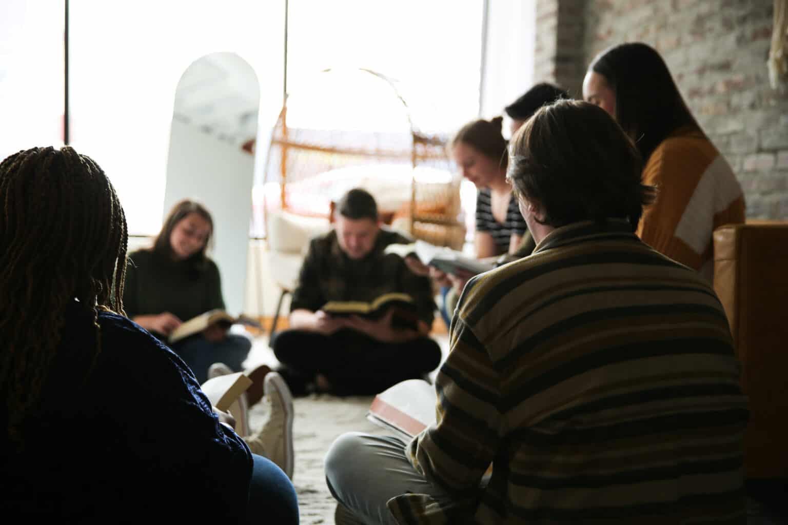 praying for non-believers people praying in a group