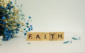 faith scrabble tiles that spell out the word faith
