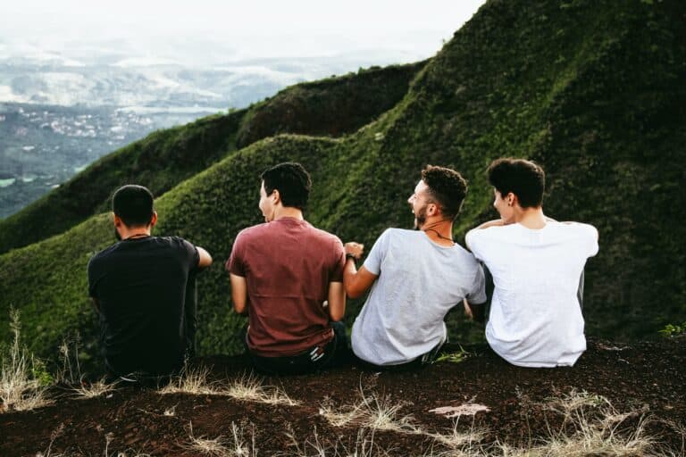 spiritual discipline four friends atop a mountain