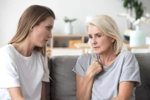 Nurturing faith. Mother and daughter having a heart to heart conversation as the daughter is questioning her faith and the mother is concerned.