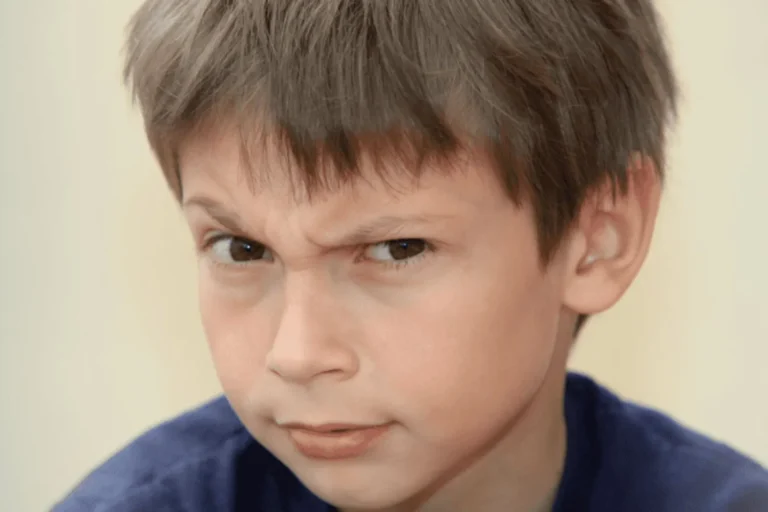 School-aged boy with a quizzical expression