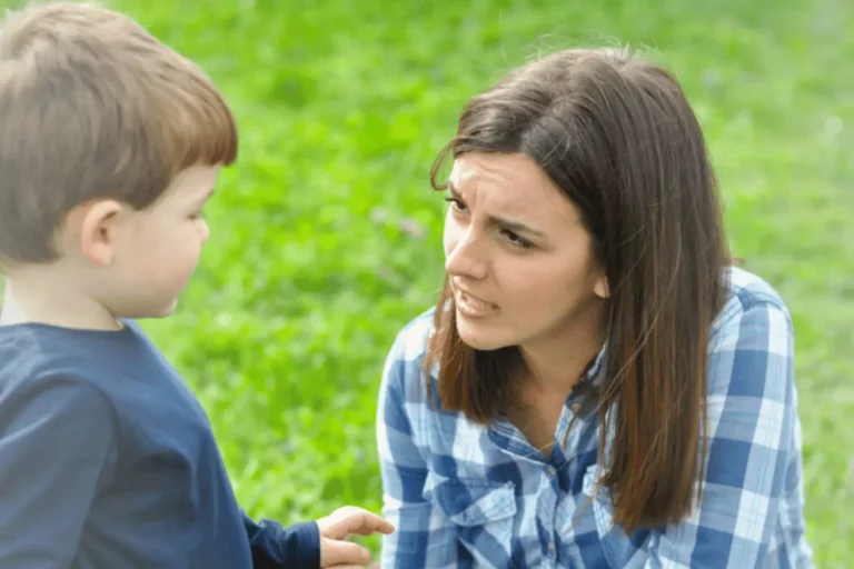 Mom looking at her little boy listening. How to get your kids talking