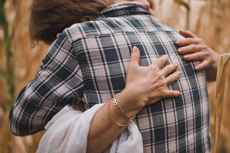 build a relationship with your adult child by supporting their parenting. Mother and adult son hugging