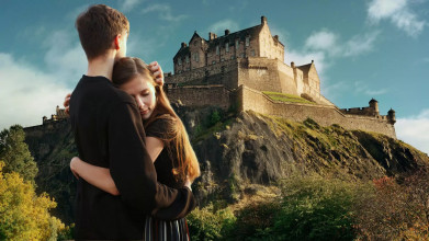 photo of a couple hugging in front of a scenic fortress, determining to strengthen their marriage commitment.