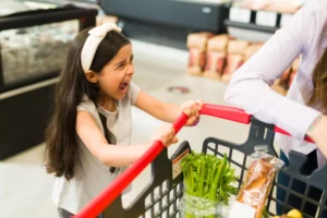 Parent Shame screaming child in a grocery store