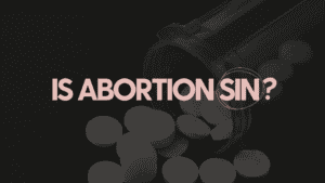 Picture of pills with words asking is abortion a sin?