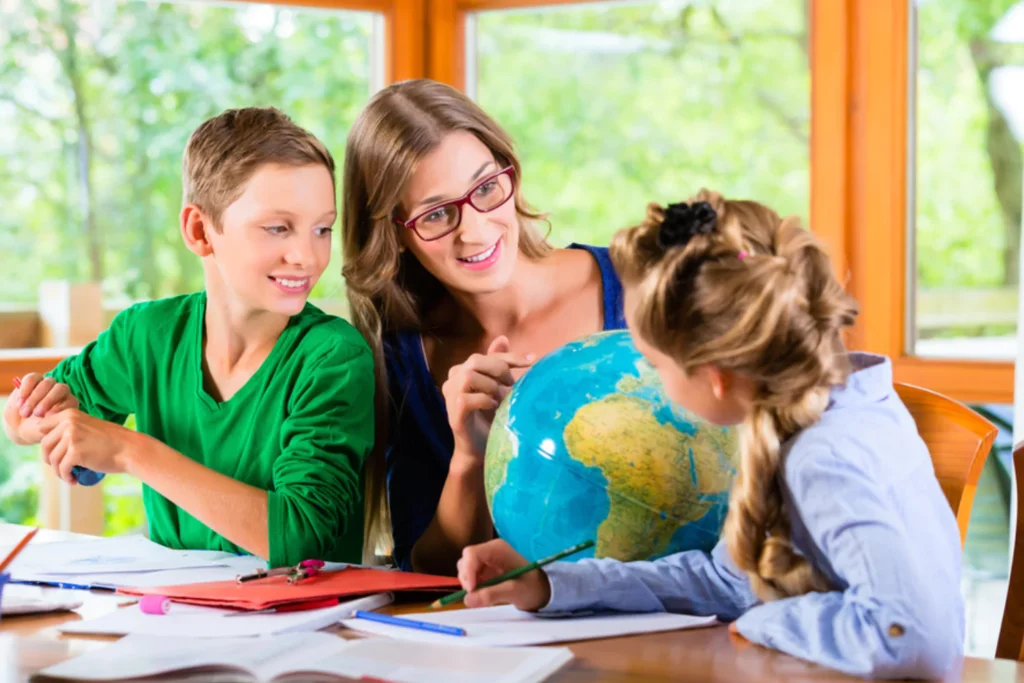 Homeschooling mom with her young son and daughter