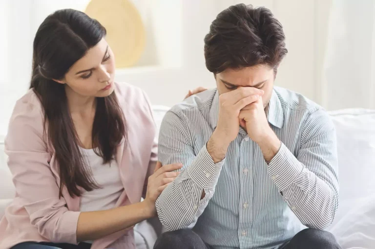 A wife comforts her husband, who is holding his head in shame. Here are the top 10 indicators your marriage will survive pornography addiction.