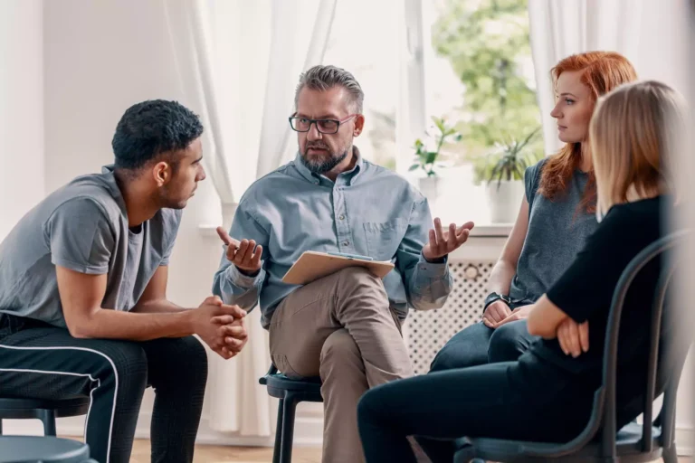 Two couples sit in a circle in discussion with one another. Finding a mentor couple willing to counsel you and your spouse takes time and effort. Here are practices you might find helpful when learning how to find a mentor couple.
