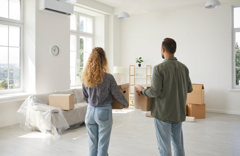 A cohabiting couple moves into an empty home.