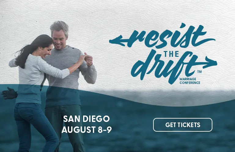 A couple happily embracing with the text 'Resist the Drift Marriage Conference' in San Diego on August 8-9. Get your tickets now.