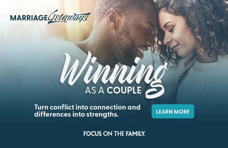 Couple smiling with foreheads together - Marriage Getaways Winning as a Couple