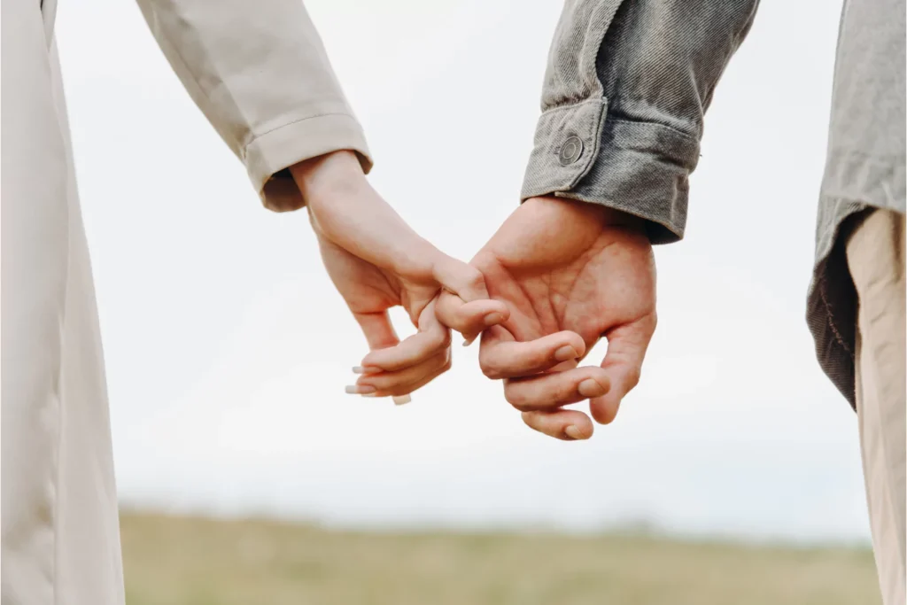 How does my calling fit with my spouse’s calling – husband and wife holding hands
