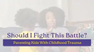 Mother talking seriously with her young child on a couch with text illustrating the challenges of parenting a kid with childhood trauma.