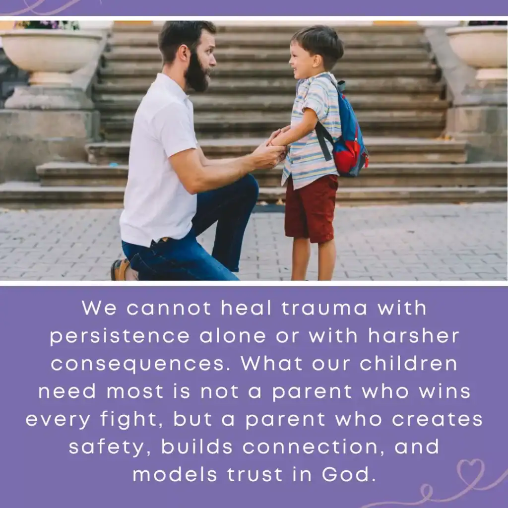 Father kneeling and holding his son’s hands while talking at eye level, with text about creating safety and connection when parenting through childhood trauma.