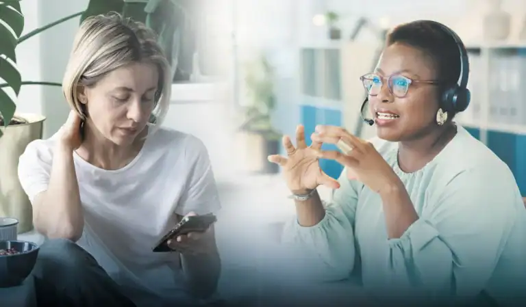 A female counselor speaking with a female client over the phone