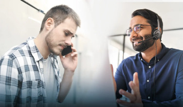 A male counselor speaking with a male client over the phone