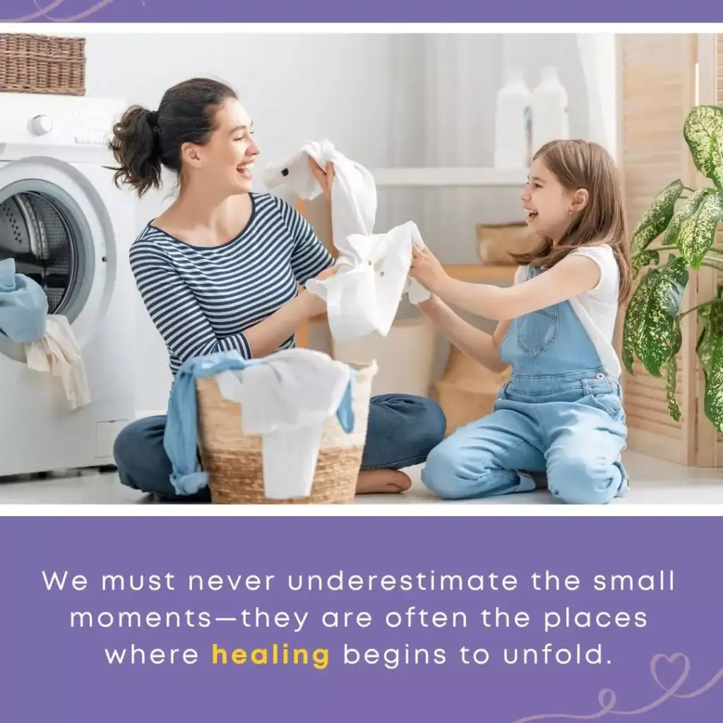 Mother and daughter laughing together while folding laundry, capturing the sacred work of foster care found in small shared moments.