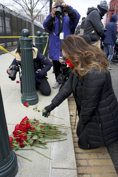 Abby Johnson lays roses on supreme court steps in honor of the those lost to aboriton.